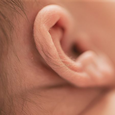 Lump Behind Newborns Ear: Causes, Treatment, & Prevention